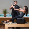 Woman in a pilates lesson.