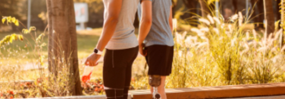 Two men walking in the forest