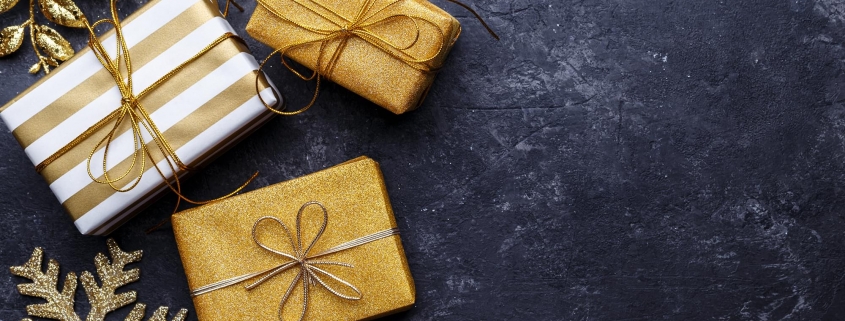 Golden holiday gift boxes.