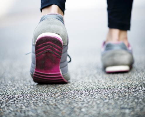 Woman walking on a road