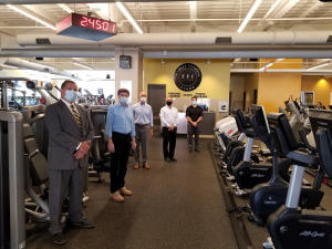 Group of people posing at the FFC Elmhurst reopening