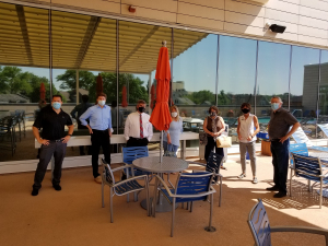 Group of people posing for a photo at the FFC Park Ridge reopening