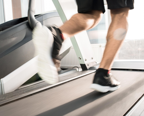 man running on treadmill