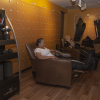 Photo fo the FFC Gold Coast recovery lounge with two women seated in compression boots