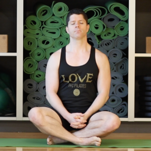 Man meditating in an Unplug group fitness class in Chicago