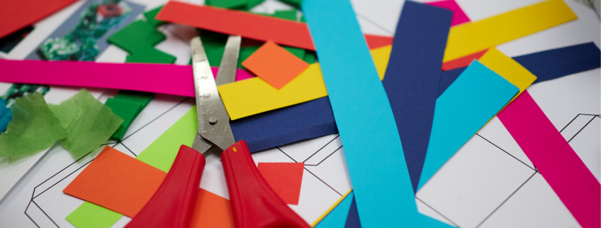 Collection of kids crafting supplies on a table.