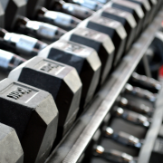 Dumbbells on a weight rack in a gym