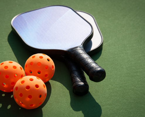 Pickleball paddles and balls