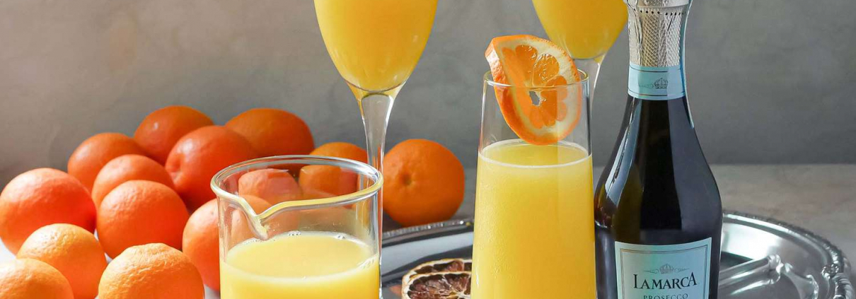 A plate of mimosas & oranges