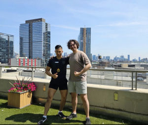 FFC Lincoln Park personal trainer Ricky Rendon on the rooftop with a client
