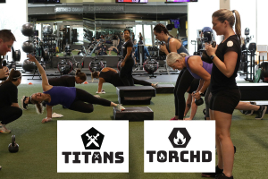 Group Training on the turf with logos overlaid for Titans and Torchd