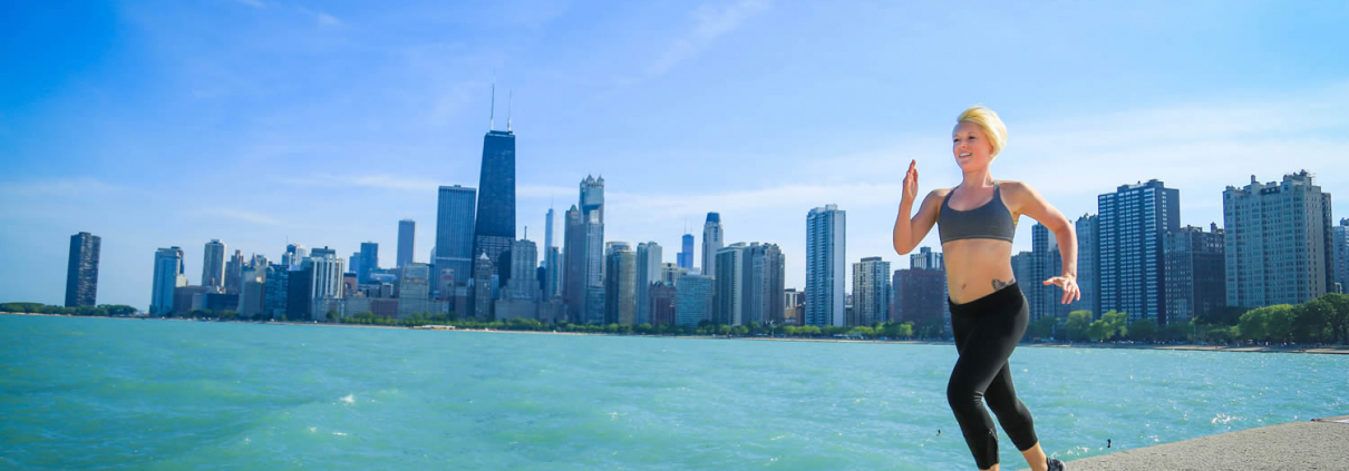 A women running on the Chicago lakefront trail
