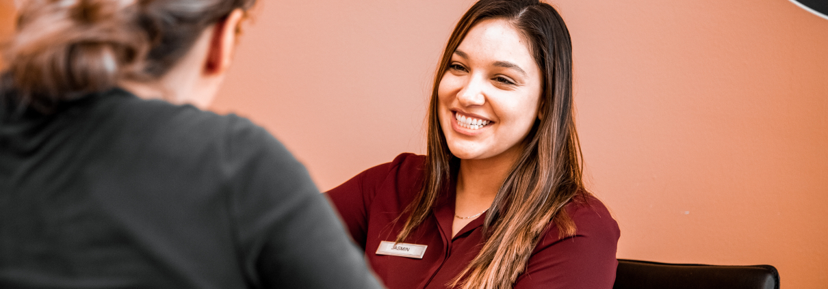 Membership Director smiling at member at Chiago's best gym