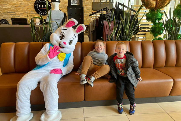 Pictures with Easter Bunny event at gym with child care.