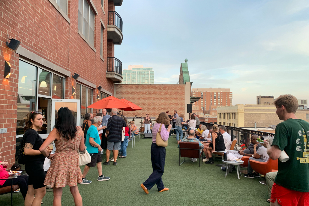 Members hanging out on the outdoor Sundeck at Best Gym in Oak Park.