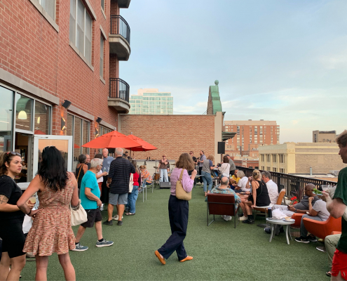 Members hanging out on the outdoor Sundeck at Best Gym in Oak Park.