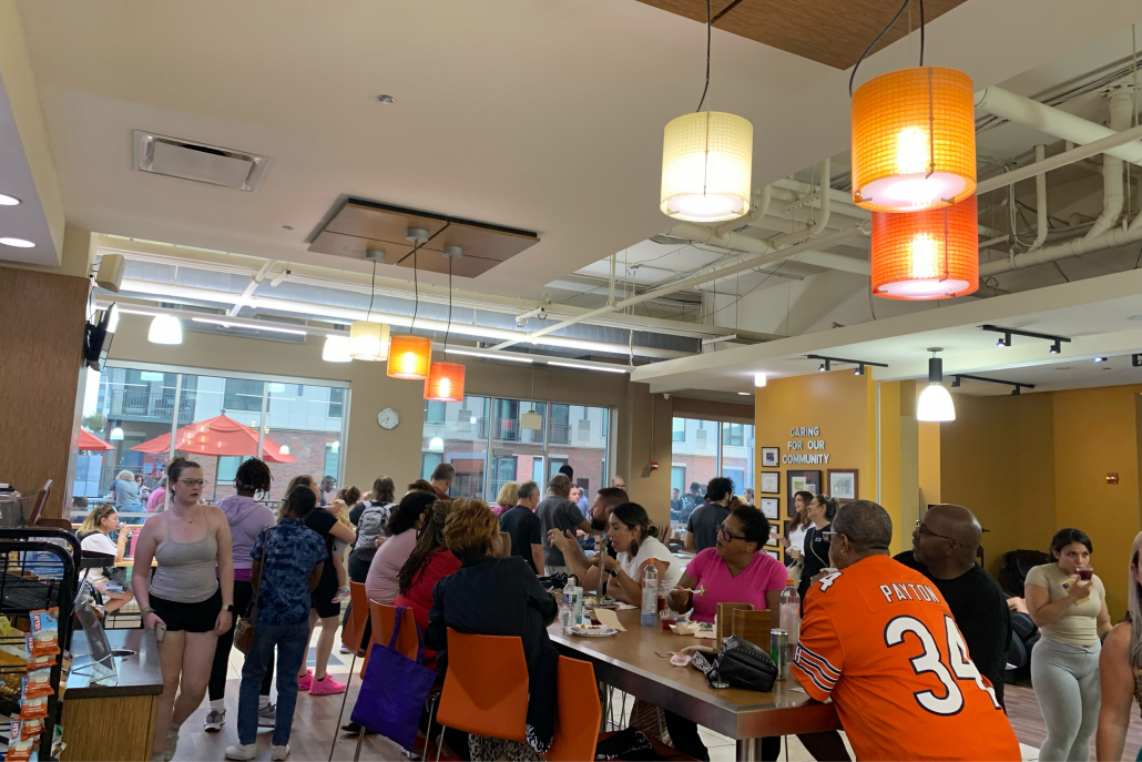 Members eating and mingling in the cafe at Oak Park gym.