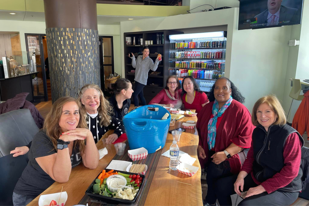 Friends eating lunch together at the Local'84 Cafe in Gold Coast gym.