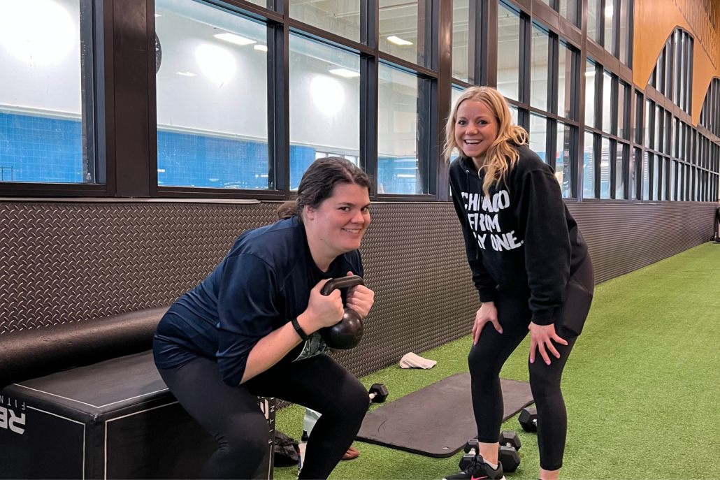 Personal trainer coaching a member at Gold Coast Gym.