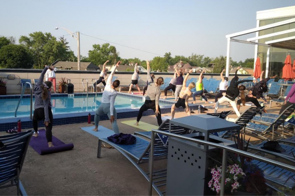 Sundeck Yoga by the outdoor pool at Best Gym in Park Ridge.