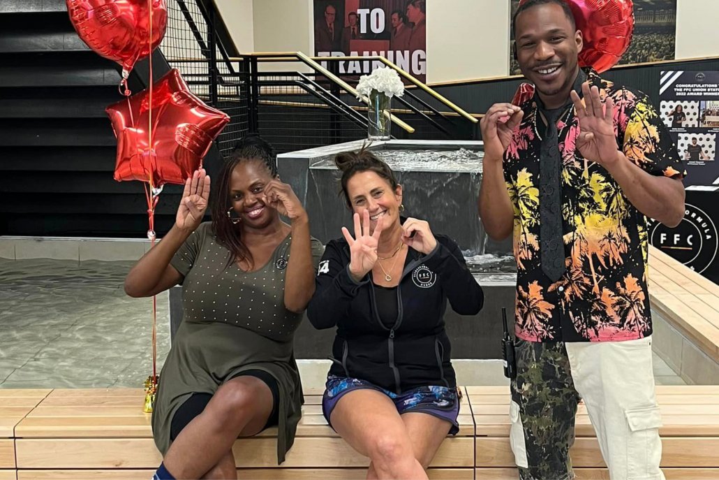 Staff celebrating FFC's 40 years at the Union Station gym.