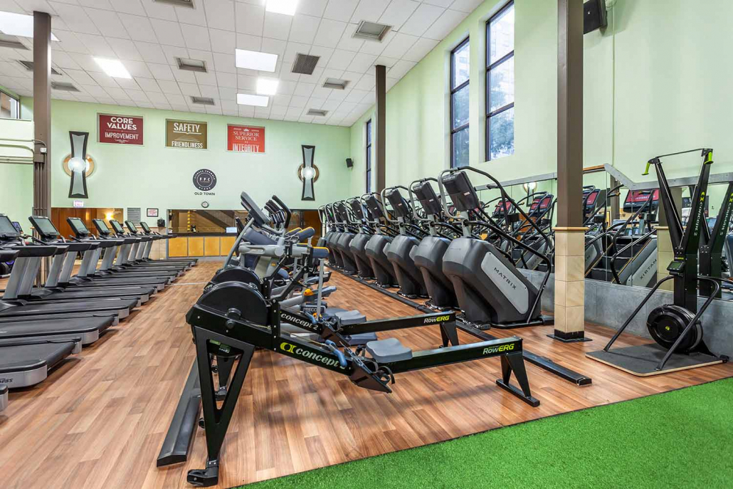 Cardio Floor with rowers, treadmills and climbmills at Old Town Chicago gym.