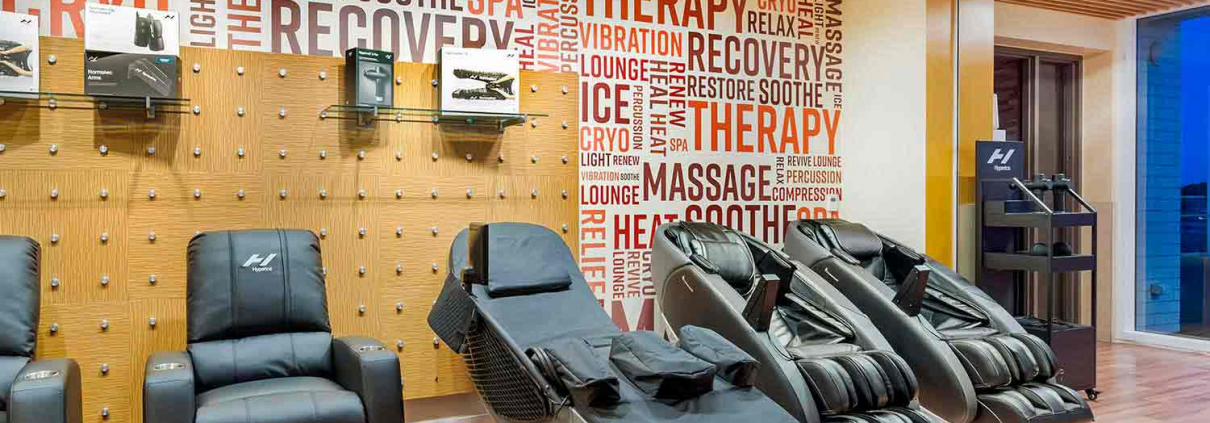 Recovery Lounge with Massage Chairs and Cryo Chairs in side FFC Elmhurst Gym.