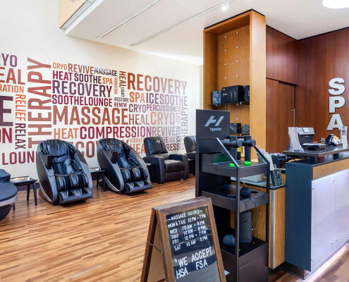 Recovery Lounge with Massage Chairs and Cyro Chairs in side FFC West Loop.