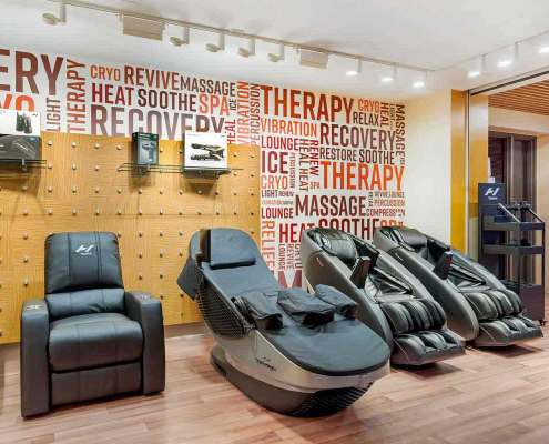 Recovery Lounge with Massage Chairs and Cryo Chairs in side FFC Elmhurst Gym.