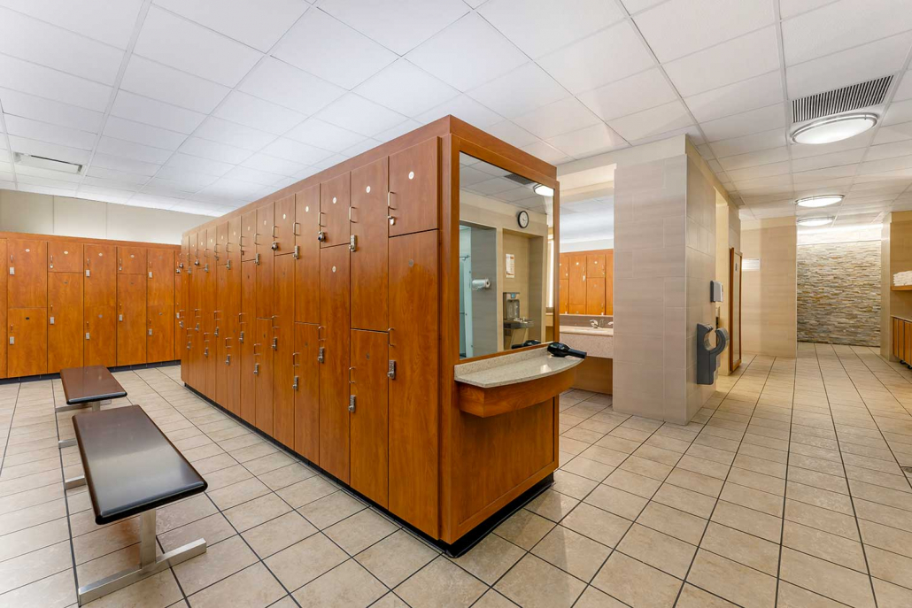 Locker room with towels and self service lockers inside FFC South Loop.