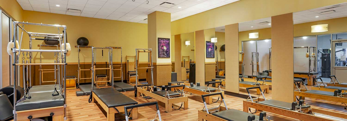 FFC South Loop Pilates Studio featuring Reformers.