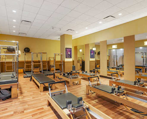 FFC South Loop Pilates Studio featuring Reformers.