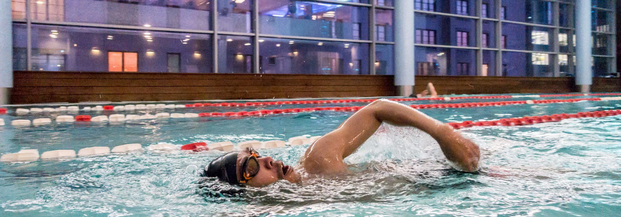 A person participating in the indoor triathlon