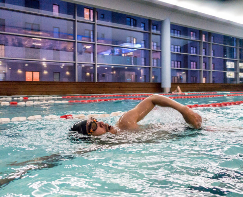 A person participating in the indoor triathlon