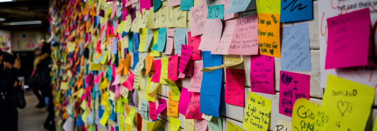 Post it notes on a board
