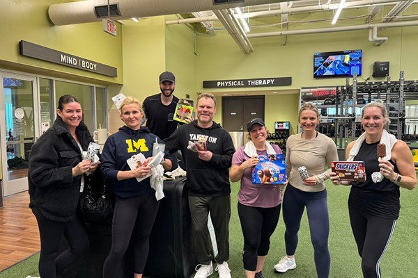 FFC Elmhurst employees/members enjoying sweets after a turf workout