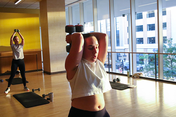 Member working out at our FFC Elmhurst location in our group fitness class.