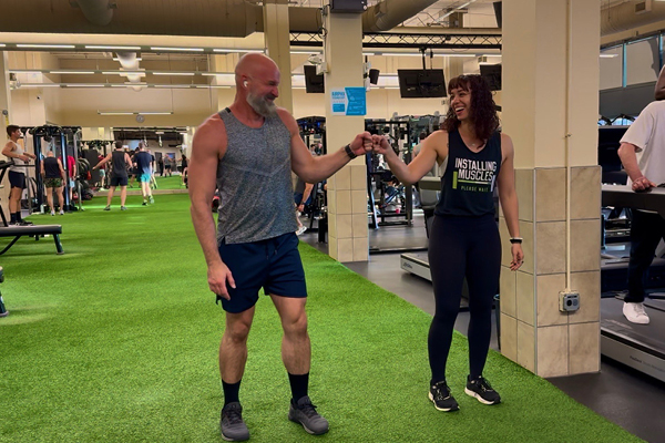 FFC East Lakeview members fist bumping on the turf