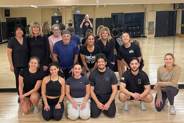 FFC Gold Coast members and personal trainer in group photo after group fitness class