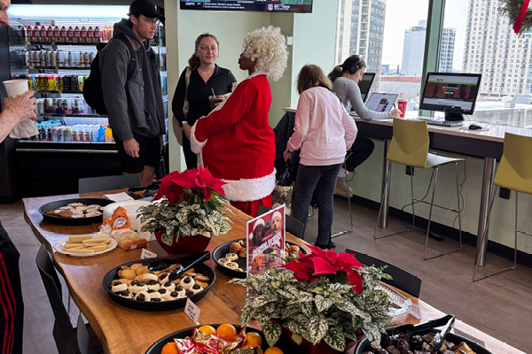 ffc Gold Coast local'84 cafe table filled with yummy food and Santa Claus in the background