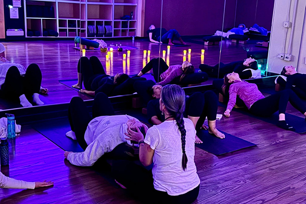 Photo of Sound Bath instructor and member at FFC South Loop