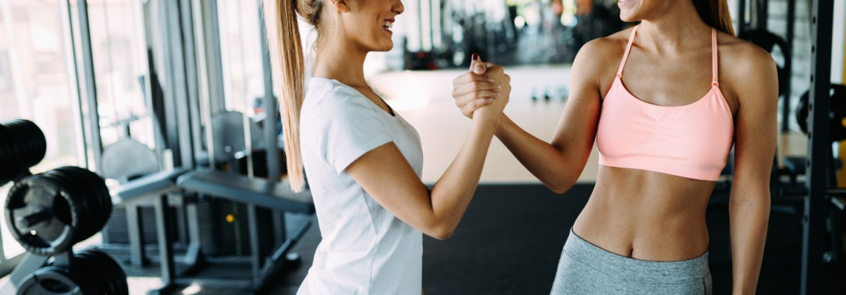 friends high fiving at best gym in chicago