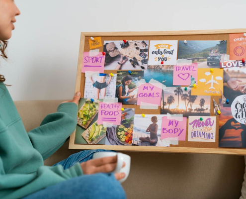 A women with a vision board